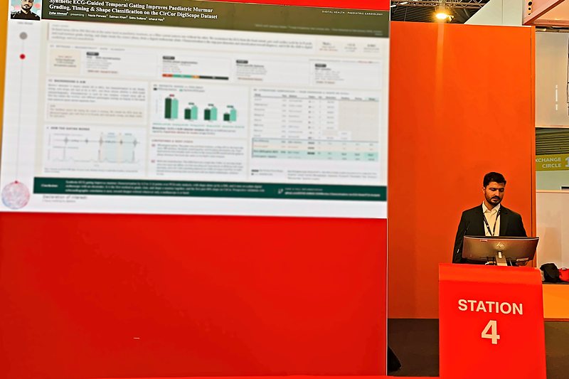 Zafar Ahmad presenting at Station 4 beside his poster at ESC Congress 2026 in Munich